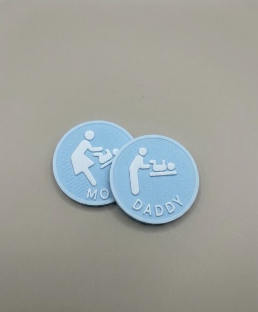 Just a little coin, to help young parents decide who is changing the diaper today…
Simple but sweet idea we designed for one of our customers!